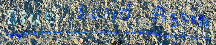  photo of glass chunks spelling out: Blue Sand Again